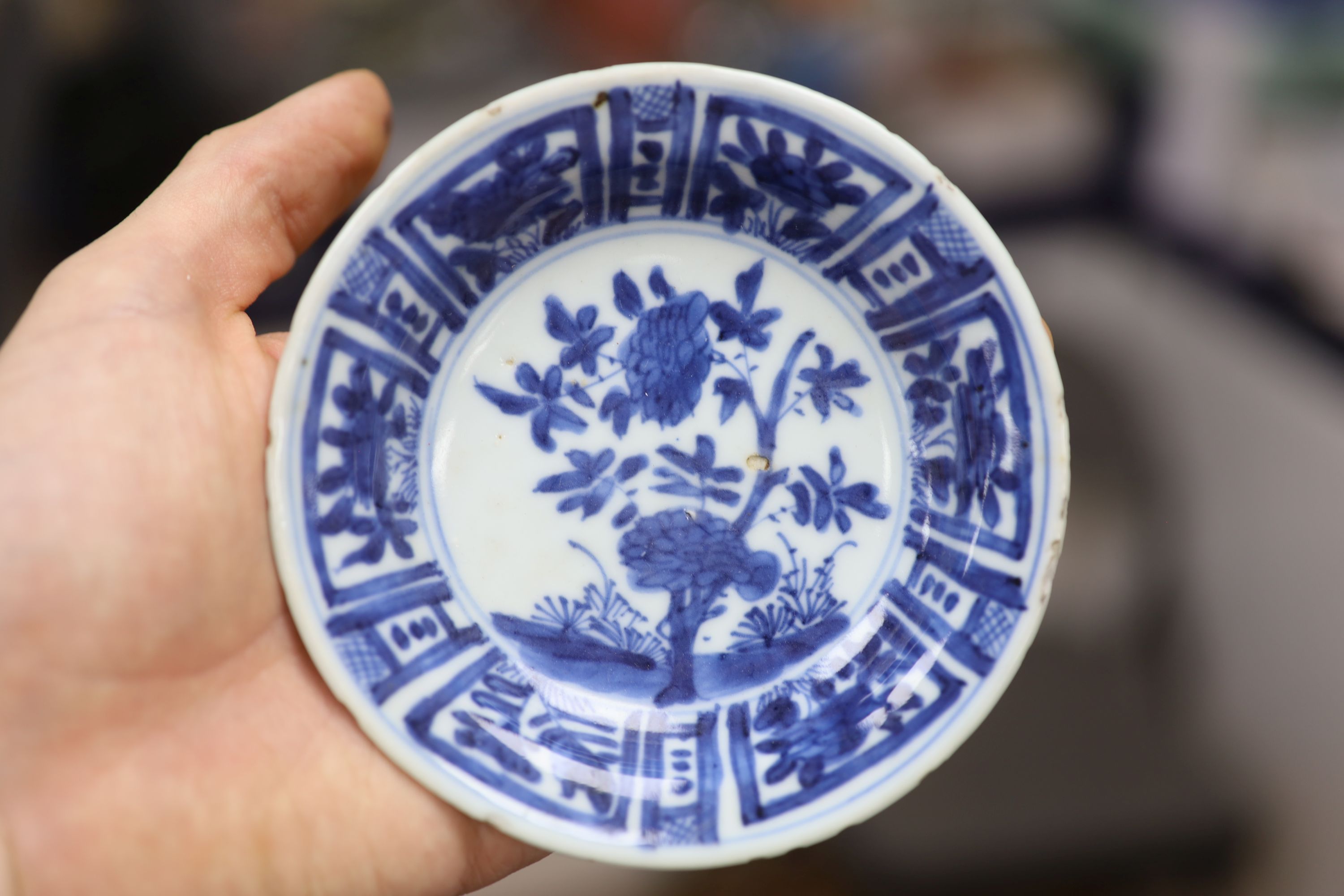 A pair of Chinese blue and white dishes and a similar jar and cover, tallest 12cm